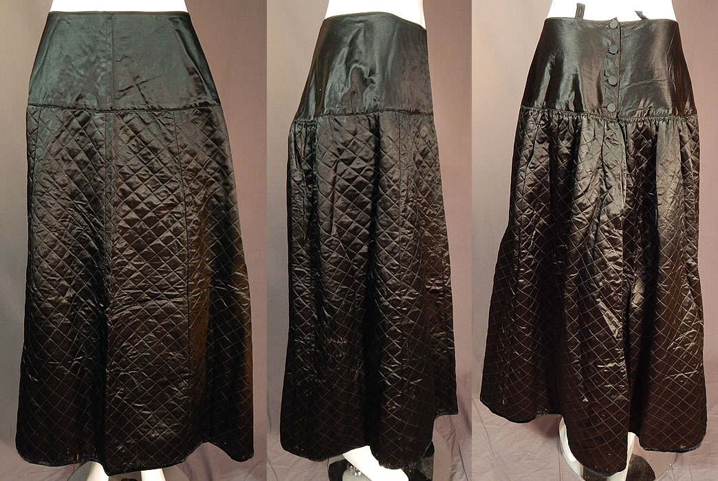Victorian Antique Black Silk Quilted Wool Winter Petticoat Skirt
This antique Victorian era black silk quilted wool winter petticoat skirt dates from 1870.