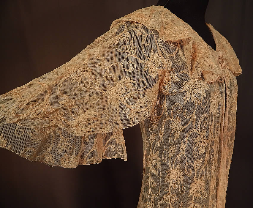 Vintage Blush Pink Tulle Net Tambour Embroidery Floral Lace Dressing Gown Robe
The dress measures 57 inches long, with a 34 inch bust, 26 inch waist and 12 inch back.