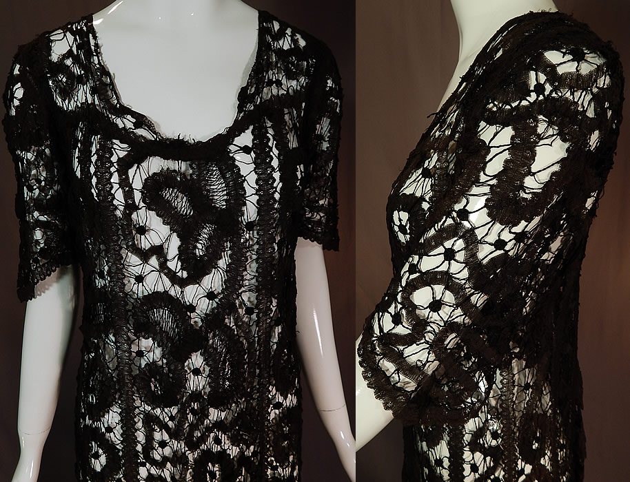 Vintage Antique Handmade Sheer Black Battenburg Bobbin Tape Lace Dress
This lovely lace dress has a long, loose fitting, straight shift style, with a low scoop neckline, short sleeves with scalloped trimmed cuffs coming to a point, an over the head style with no side opening closures and is sheer, unlined.