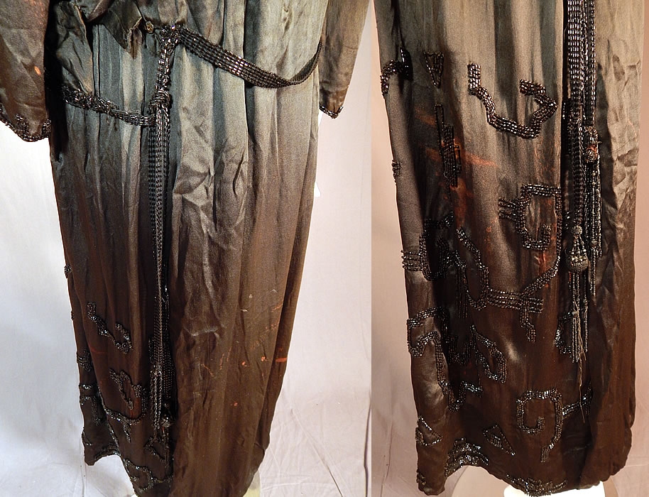 Vintage Art Deco Black Silk Pyramid Beaded Watteau Back Drape Flapper DressIt is in fair as-is condition, needing restoration, with some loose missing beads, fade discoloration in areas, frayed splits on the inside silk lining and blue silk fabric backing (see close-ups). Would be great for design, study or pattern.