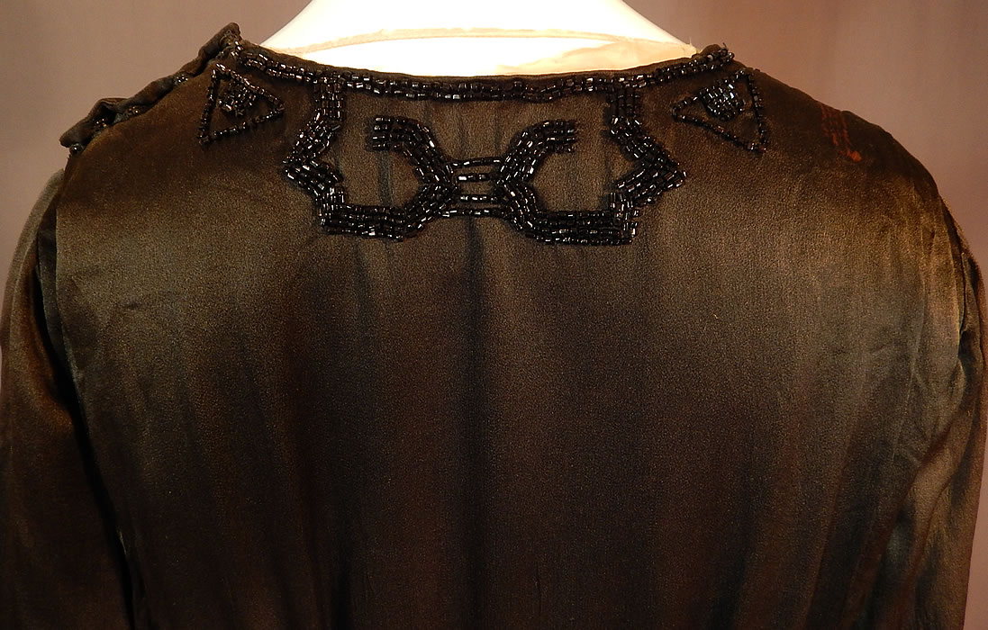 Vintage Art Deco Black Silk Pyramid Beaded Watteau Back Drape Flapper Dress
This is truly a wonderful piece of Art Deco beaded textile art!