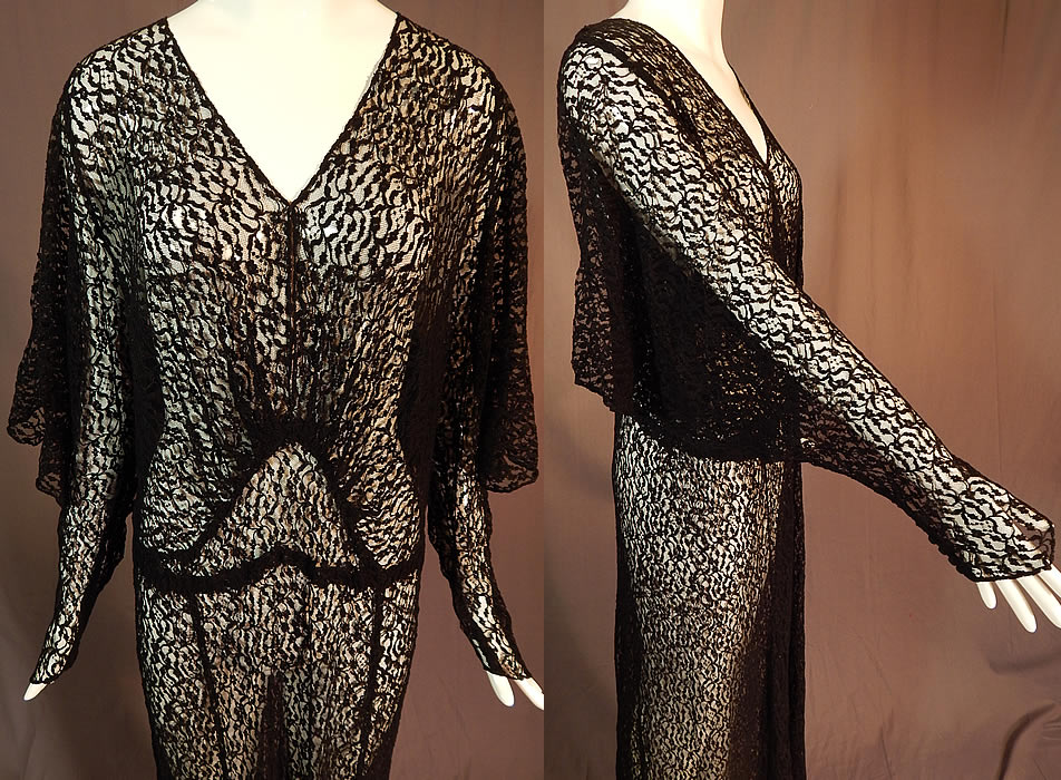 Vintage Art Deco Sheer Black Lace Batwing Bias Cut Evening Gown Gothic Dress
This gorgeous goth gown has a form fitting bias cut, is a long floor length, with batwing flared sleeves which have open slits along the arms and come to a point at the fitted button cuffs, a key hole opening on the front neckline, no side opening closure and is sheer completely unlined.