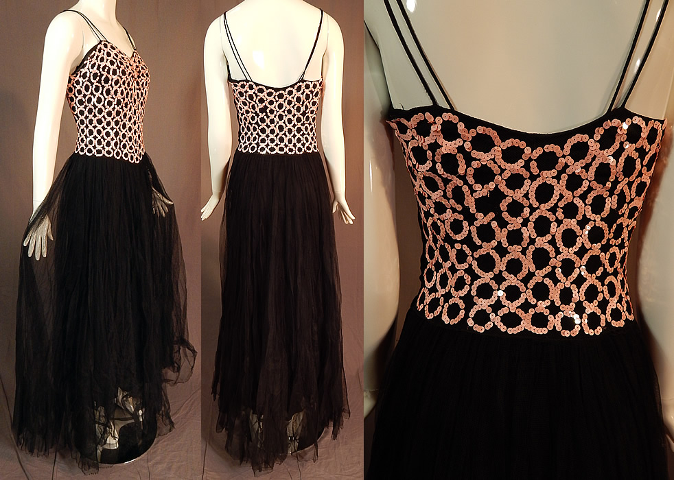 Vintage Black Tulle Net Pink Sequin Beaded Formal Evening Gown Dress
This fabulous formal, elegant evening gown is a long floor length, with double spaghetti straps, a sweetheart neckline, long flowing full layered net skirt, side zipper closure and is fully lined with a black nylon slip sewn inside. The dress measures 62 inches long, with a 34 inch bust, 24 inch waist and 36 inch hips. It is in good as-is condition, with only a few missing pink sequins and the bottom skirt hem is out with some fraying along the edging. This is truly a wonderful piece of wearable art!