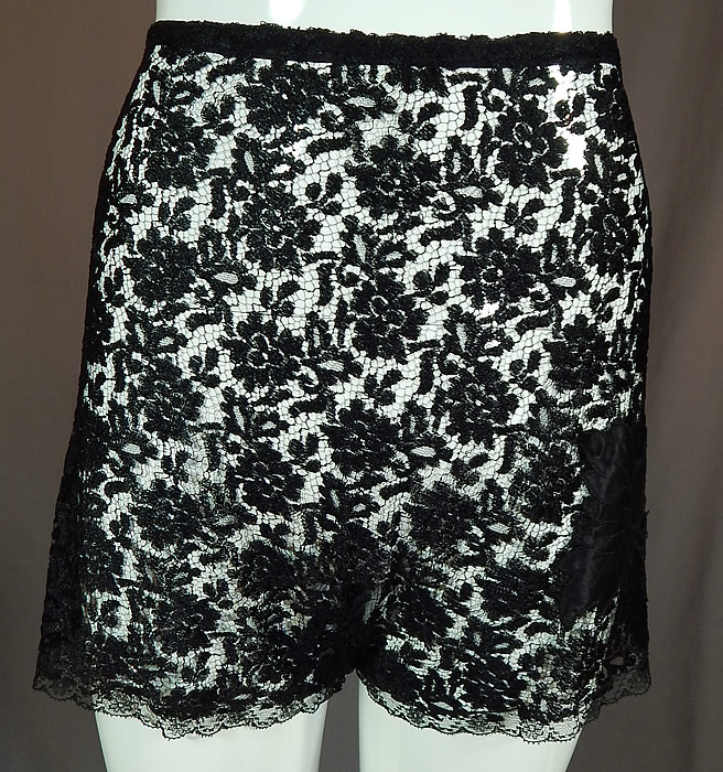 Vintage Eve's Leaves by Chevette Lingerie Black Lace Silk Fig Leaf Applique Tap Panties
The "Eve's Leaves by Chevette" label has been cut out leaving only a small white remnant on the back waist. The panties measure 14 inches long, with a 28 inch waist and 36 inch hips.