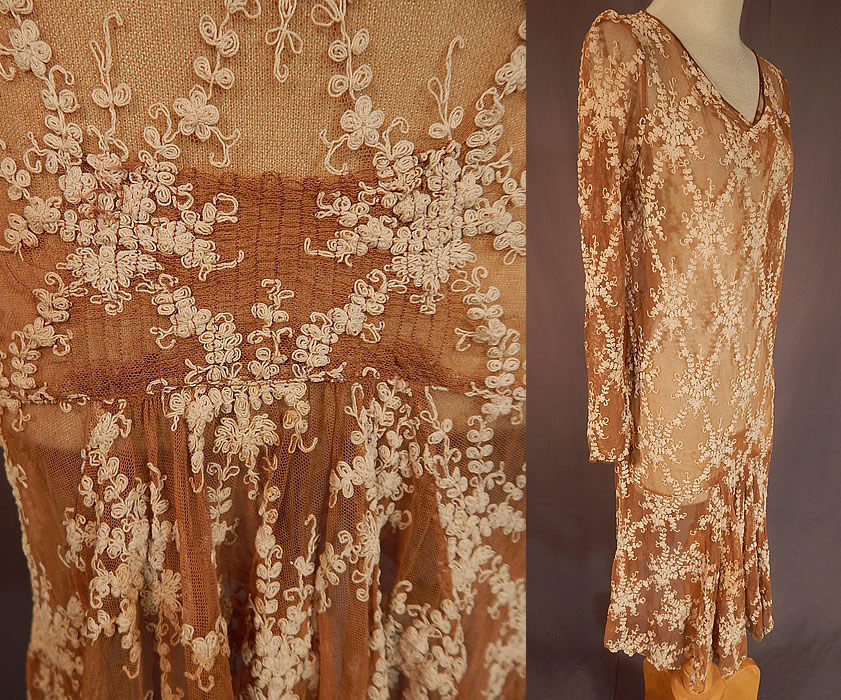 Vintage Ecru Beige Tulle Net Tambour Embroidery Lace Drop Waist Dress
This lovely loose fitting, drop waist style dress has gathered shoulders, long tapered sleeves, a short flared full skirt with ruched gathering on the front and is sheer, unlined.