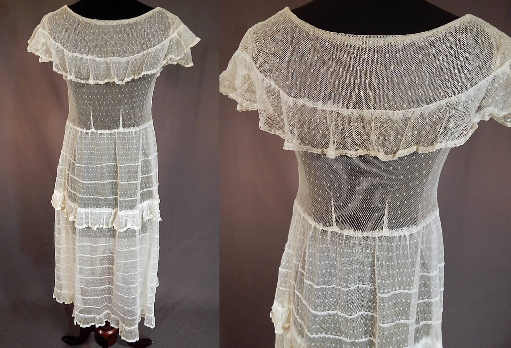Vintage Swiss Polka Dot White Tulle Net Lace Shawl Collar Capelet Dress
The dress measures 40 inches long, with a 32 inch bust and 26 inch waist. It is in good condition, with only a small frayed open seam along the collar edging. This is truly a wonderful piece of wearable lace art!