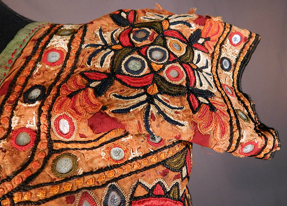 Vintage Indian Gujarat Kutch Work Embroidery Mirrorwork Choli Boho Blouse Top
It is in fair as-is condition, with several frays and splits in the silk fabric which has the hand embroidery work stabilized on the heavier cotton fabric backing (see close-ups).