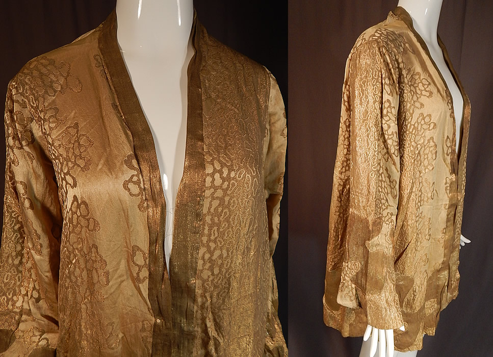 Vintage Art Deco Applique Pattern Gold Lame Long Flapper Coat Jacket
This fabulous flapper coat jacket has a loose fitting long mid length robe style, with an open front, no closures, long full sleeves and is fully lined in a silk fabric with some small faint stains inside.