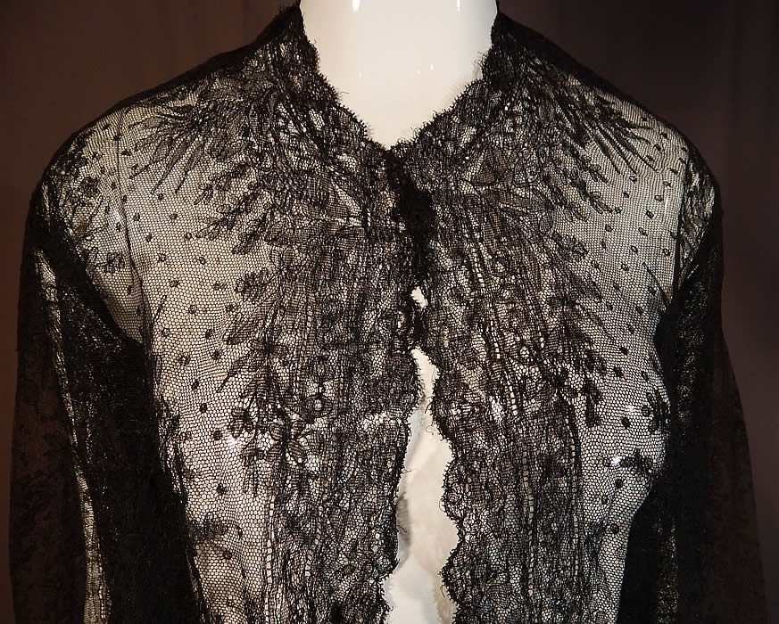 Victorian Antique Black Chantilly Lace Shawl Wide Pagoda Sleeve Jacket
It is made of a sheer fine delicate black net French Chantilly lace, with a Swiss dot, floral foliage leaf pattern outlined in black threads with detailed shading effects and a decorative scalloped border edging. 