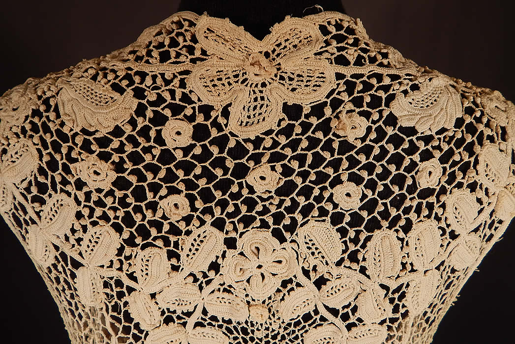Edwardian Antique White Irish Crochet Lace Long Sleeveless Vest Jacket
It is in excellent condition. This is truly a rare and exceptional, quality made piece of wearable antique Irish crochet lace art!