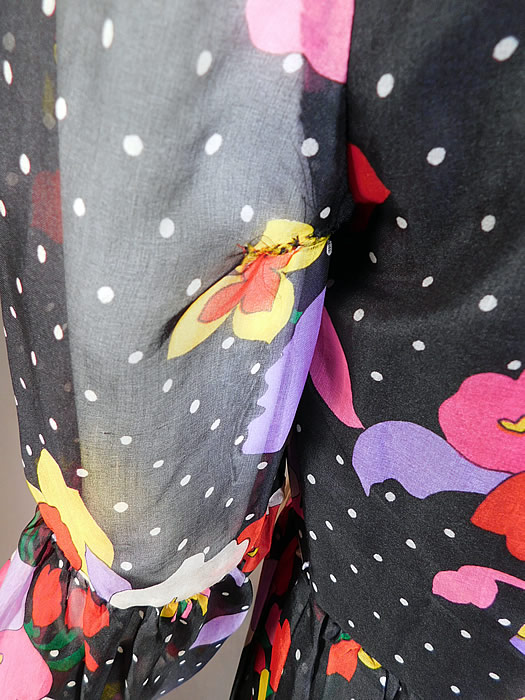 Vintage Mollie Parnis Boutique Floral Polka Dot Print Poet Sleeve Boho Maxi Dress
It is in good as-is condition, with only a few faint tiny stains on the front and a small repair mend on the back under one arm (see close-ups). This is truly a wonderful piece of boho hippie wearable art! 