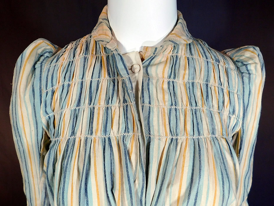 Victorian Striped Print Flannel Wool Watteau Wrapper Workwear Morning Dress
The dress measures 53 inches long, with a 34 inch bust, 26 inch waist, 52 inch hips, 22 inch long sleeves and a 11 1/2 inch back. 