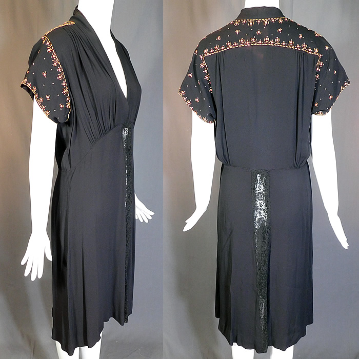 Vintage Black Silk Charmeuse Gold Studded Coral Rhinestone Beaded Cocktail Dress
There are gold metal studs, coral and rhinestone beading decorating the back, shoulders and sleeves, with a sheer black lace trim insert down the skirt. This beautiful beaded cocktail dress has a plunging V front neckline with pleating details on the top, short cap sleeves, a side zipper closure and is unlined. 