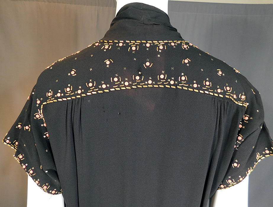 Vintage Black Silk Charmeuse Gold Studded Coral Rhinestone Beaded Cocktail Dress
The dress measures 43 inches long, with a 38 inch bust, 32 inch waist and 42 inch hips.