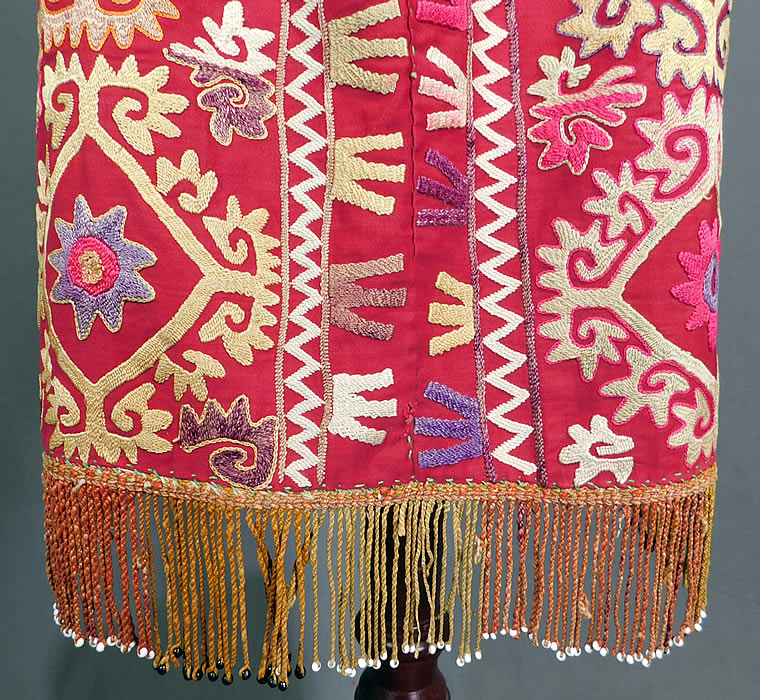 Vintage Antique Uzbekistan Suzani Embroidered Tribal Textile Half Apron Skirt
The apron measures 23 inches long, with an additional 3 inch fringe along the bottom and is 22 inches wide, 75 inches with the waist ties.