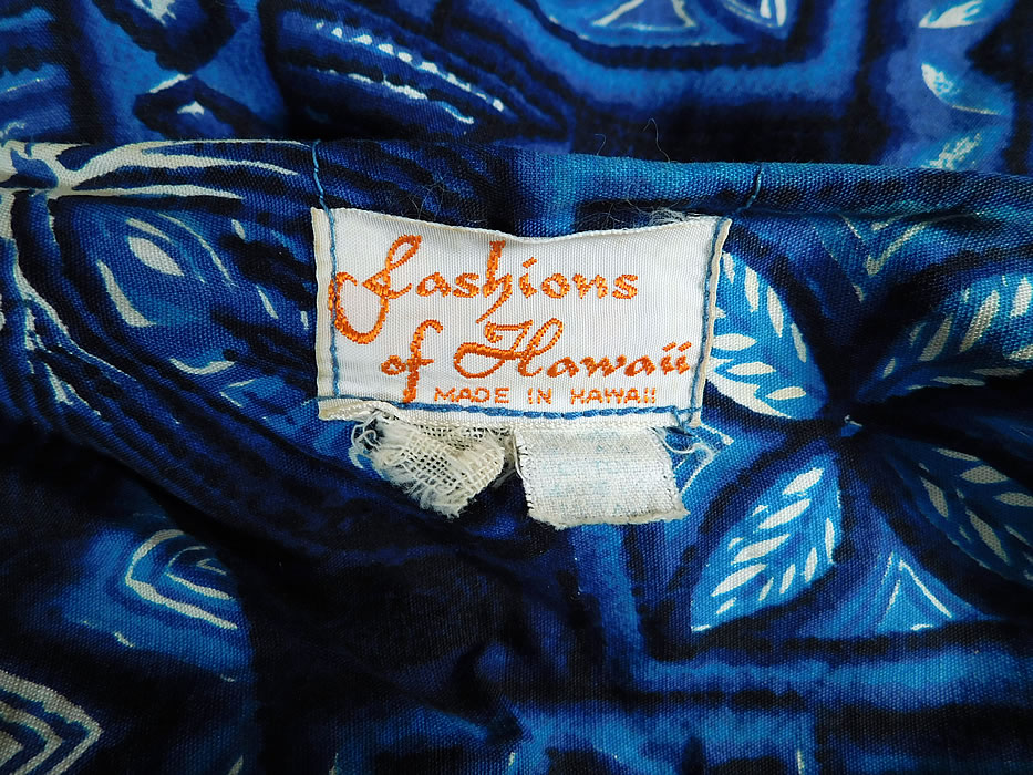 Vintage Fashions of Hawaii Blue Hawaiian Polynesian Print Cotton Shift Dress
There is a "Fashions of Hawaii Made in Hawaii" label sewn inside. The dress measures 38 inches long, with a 38 inch bust, 36 inch waist and 38 inch hips. It is in excellent condition. This is truly a wonderful piece of vintage Hawaiiana wearable art! 