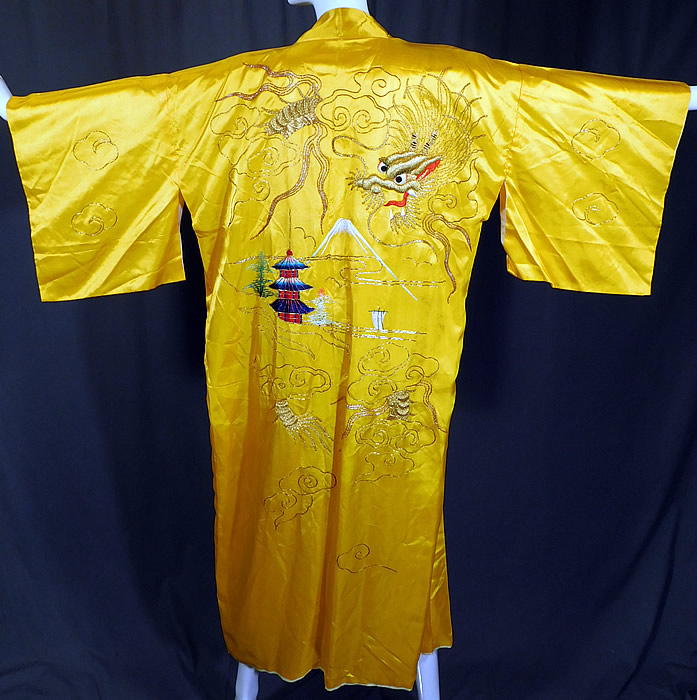 Vintage WWII Japanese Gold Couching Embroidery Dragon Yellow Kimono Robe
The robe measures 52 inches long, with a 42 inches chest, 42 inch waist and 26 inch back seam.