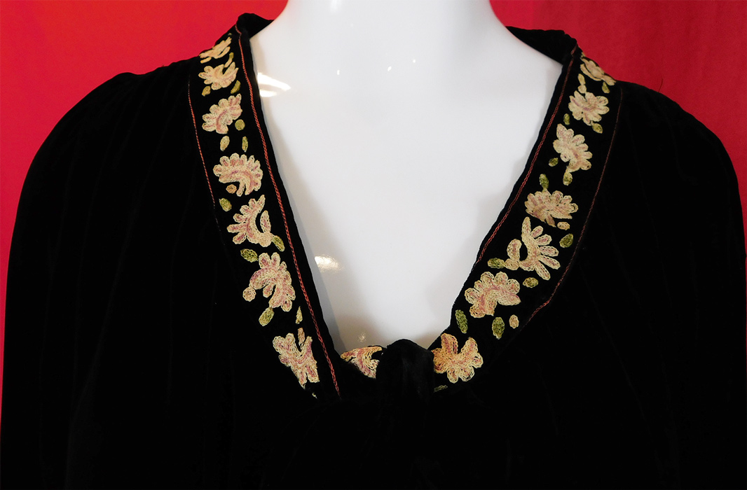Vintage Black Velvet Pastel Chain Stitch Embroidered Flowers Drop Waist Dress
It is made of a black luxurious silk velvet fabric, with colorful pastel chain stitch hand embroidered flower trim accents and edging.
