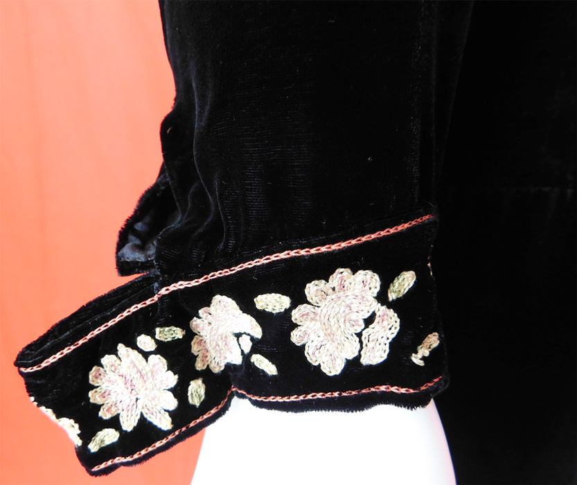 Vintage Black Velvet Pastel Chain Stitch Embroidered Flowers Drop Waist Dress
It is in good as-is condition with a few tiny pin holes scattered and a small mended repair on the back top (see close-up). This is truly a wonderful piece of wearable art!