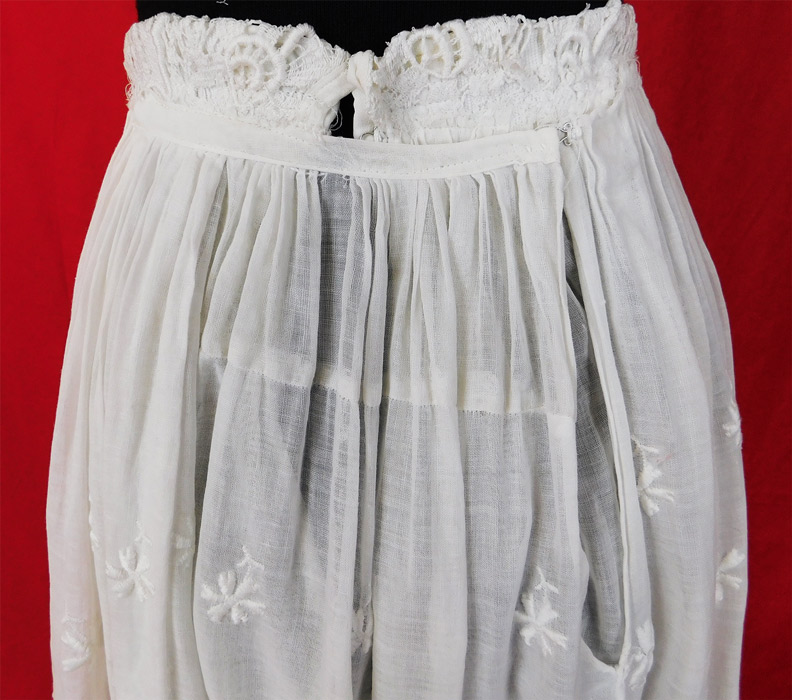 Edwardian Embroidered White Cotton Batiste Lace Layered Tea Length Skirt
The skirt measures 34 inches long, with a 22 inch waist and 40 inch hips. 