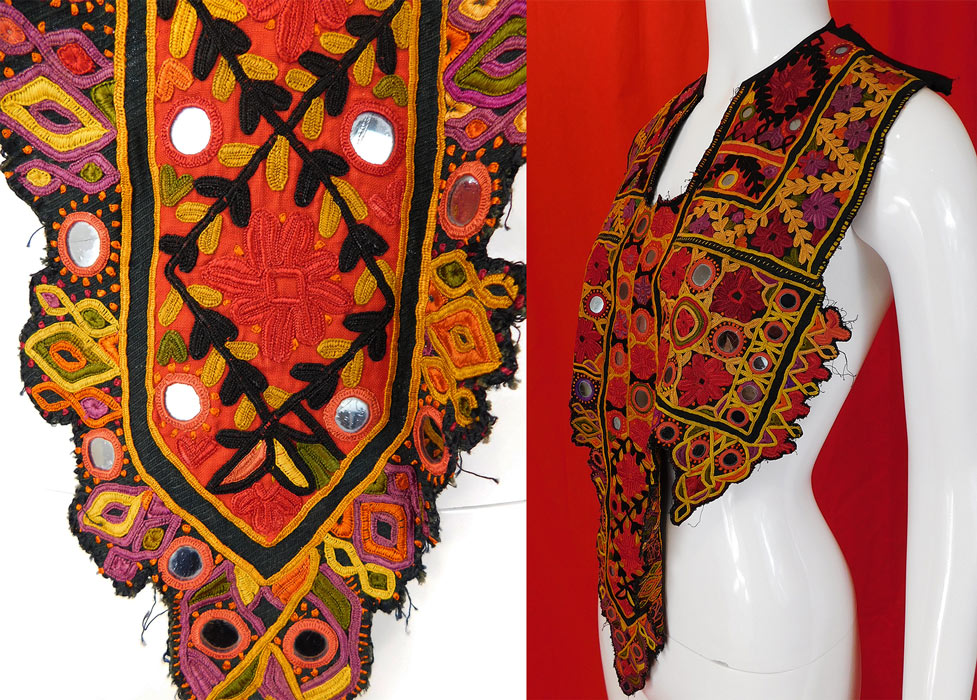 Vintage Indian Gujarati Kutch Work Ethnic Embroidered Mirror Boho Bib Top
The top measures 26 inches long in the front, 13 inches wide at the top, 16 inches wide mid top and 6 inches wide at the bottom front. 