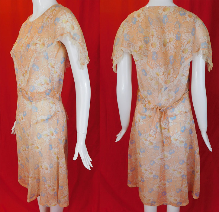 Vintage Daisy Flower Flour Feed Sack Cotton Print Frock Belted House Dress
The dress measures 40 inches long, with a 34 inch bust, 30 inch waist and 36 inch hips.