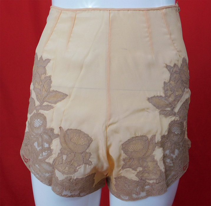 Vintage Zipanty Pink Silk Ecru Lace Trim Tap Pants Panties Lingerie
This lovely lace lingerie tap pants panties, knickers, bloomers have a full short pant leg, pleated details on the front waist, a side zipper closure and is unlined.