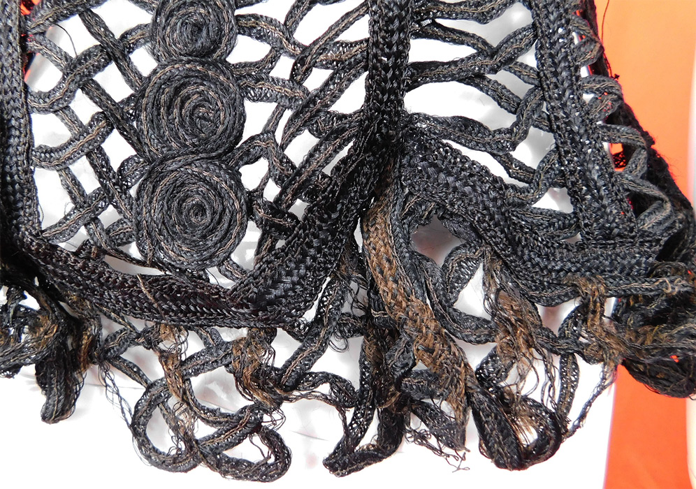 Victorian Black Silk Battenburg Braided Woven Tape Lace Latticework Jacket
It is in good as-is condition, with the original silk lining having been removed and some fraying, discoloration along the bottom hemline, sleeve cuffs (see close-ups). This is truly a wonderful piece of antique Victoriana wearable art! 
