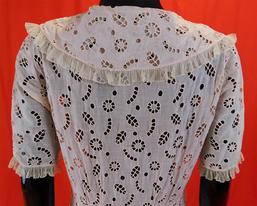 Vintage Pink Cotton Eyelet Circular Cutwork Polka Dot Shawl Collar Bias Cut Dress
The dress measures 45 inches long, with a 36 inch bust, 32 inch waist, 40 inch hips and 14 inch back. 