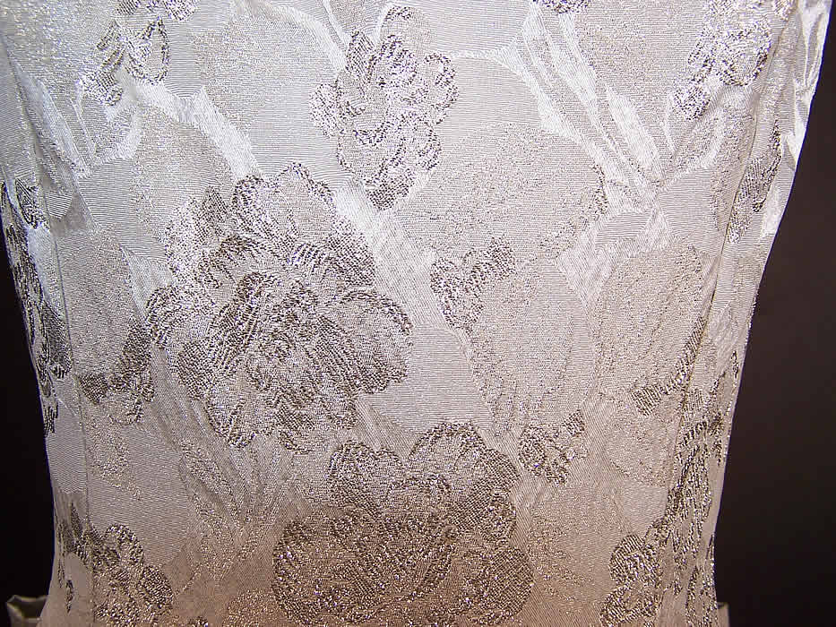 Vintage Silver Lam&eacute; Brocade Rosette Bustle Bow Ball Gown Dress close-up view.
