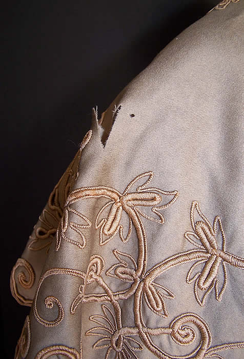 Annie Low Edwardian Ecru Wool Embroidered Eyelet Double Breasted Coat Jacket a small rip on the shoulder collar close up.