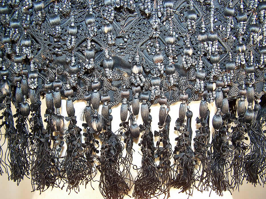 Victorian Black Silk Tassel Jet Beaded Mantle Cape Capelet Cloak with only a few loose missing beads and some fraying of the silk tassels which has worn off in areas 