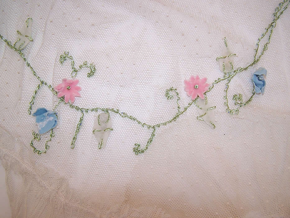 Vintage White Polka Dot Net Pastel Rosette Embroidered Ruffle Bias Cut Dress Gown extreme close up.