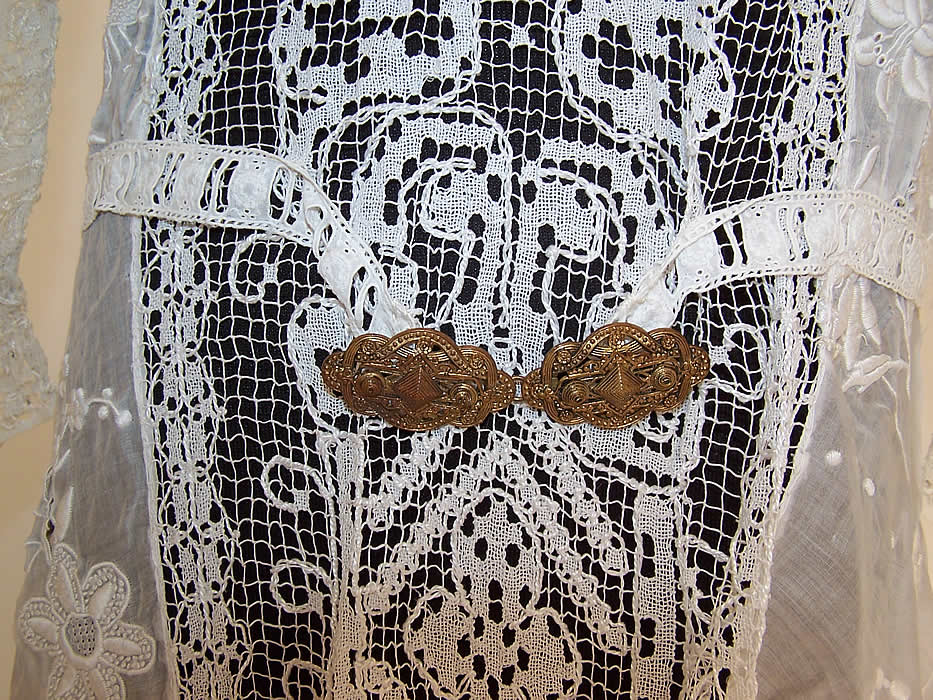 White Embroidered Batiste Filet Lace Belted Drop Waist Dress close up of fancy brass buckle clasp