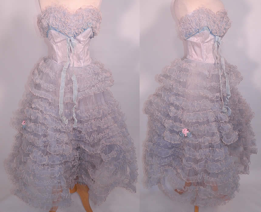 Vintage Baby Blue Ruffle Tulle Net Strapless Formal Cupcake Dress. This vintage baby blue ruffle tulle net strapless formal cupcake dress dates from the 1950s. It is made of a pale pastel light baby blue color taffeta fabric lining, with a matching color sheer tulle net ruffle fabric overlay.