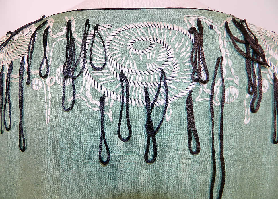 Vintage Green Silk Embroidered Mushroom Fringe Flapper Dress close up.