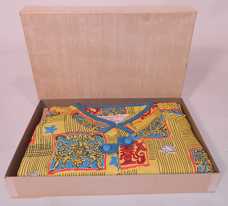 Deadstock Vintage Miss Siren Gothic Print Rayon Pajamas Lounge Set in Box. It is made of a colorful bright yellow and turquoise blue rayon fabric, with a gothic revival print design. 