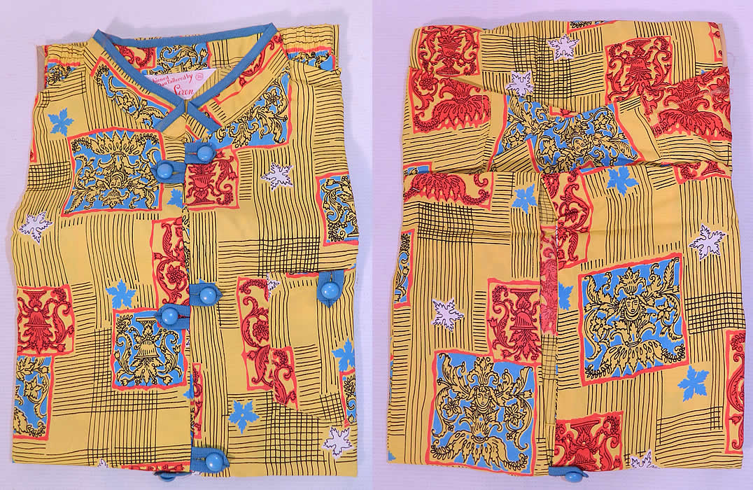 Deadstock Vintage Miss Siren Gothic Print Rayon Pajamas Lounge Set in Box. This pretty pajamas sleepwear set has a short sleeve shirt top, with a mandarin collar, breast pocket, turquoise blue plastic buttons and matching fabric pants.