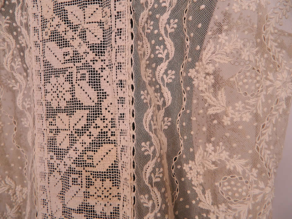 Vintage Silk Rosette White Embroidered Net Filet Lace Drop Waist Chemise Dress. It is in good condition, with only two tiny holes on the front net and a small faint stain on the back filet lace center panel insert (see close-ups). This is truly a wonderful piece of wearable lace art! 