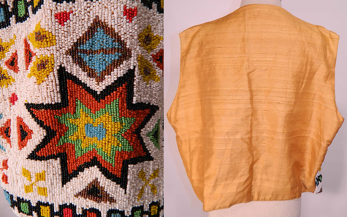 Vintage Antique Native American Indian Style Beaded Boho Hippie Vest. This beautiful beaded boho hippie sleeveless vest top has an open front with no closure, a gold color raw silk fabric backing and inside lining. The vest measures 19 inches long, with a 38 inch waist, 40 inch bust and 21 inch back. It is in excellent condition. This is truly a wonderful one of a kind piece of wearable Southwestern Native American Indian inspired beaded art!