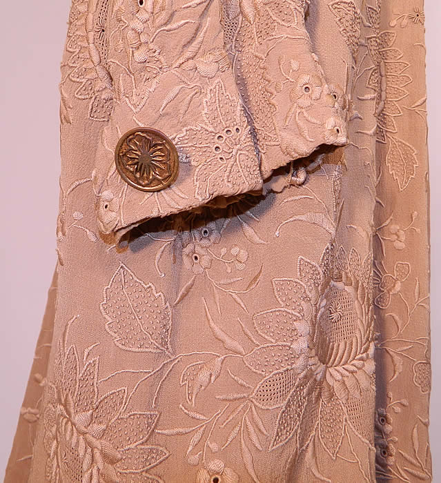 Vintage Art Deco Ecru Silk French Knot Embroidered Drawn Work Robe Coat. This fabulous flapper robe coat jacket has a loose fitting style, with an open front and no closure, is a long mid length, with long sleeves, floral bronze buttons on the cuffs, pleating details on the back neck and is unlined.
