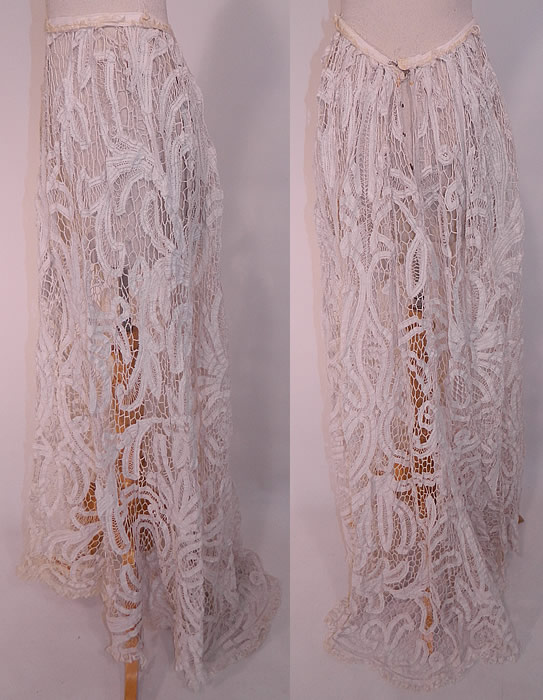 Edwardian Antique White Battenburg Tape Lace Bridal Wedding Skirt Train. This lovely lace long floor length skirt has a slight back train with scalloped lace trim ruffle edging, a fitted waistband, hook closures down the back and is sheer, unlined.