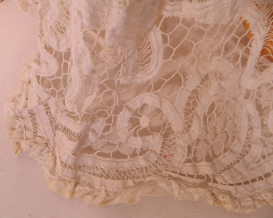 Edwardian Antique White Battenburg Tape Lace Bridal Wedding Skirt Train. The skirt measures 42 inches long, with a 24 inch waist. It is in good condition, with only a few breaks in the lace connecting brides and bars. 