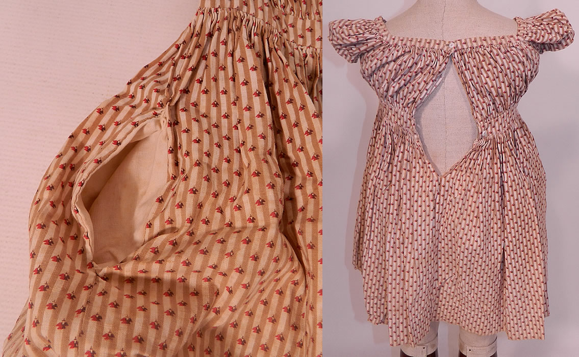 Victorian Childs Chintz Calico Cotton Stripe Print Girls Dress. There are two button closures on the back. The dress measures 19 inches long, with a 18 inch waist and 20 inch bust. 