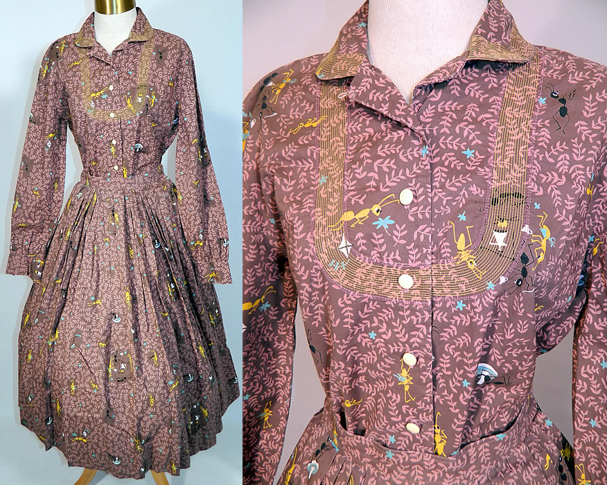 Vintage Ants Picnic Camping Novelty Print Cotton Circle Skirt Blouse Dress. It is made of a brown cotton fabric, with a pink, blue, yellow, black & white novelty print of cartoon ants camping and frolicking in the outdoors.
