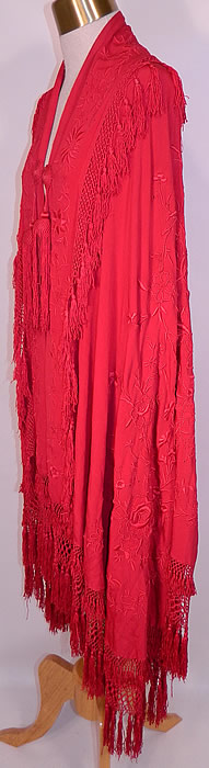 Antique Edwardian Red Silk Embroidered Tassel Piano Shawl Cloak Cape. There are large red silk tassel trim accents hanging down the back and on the front tie closure.