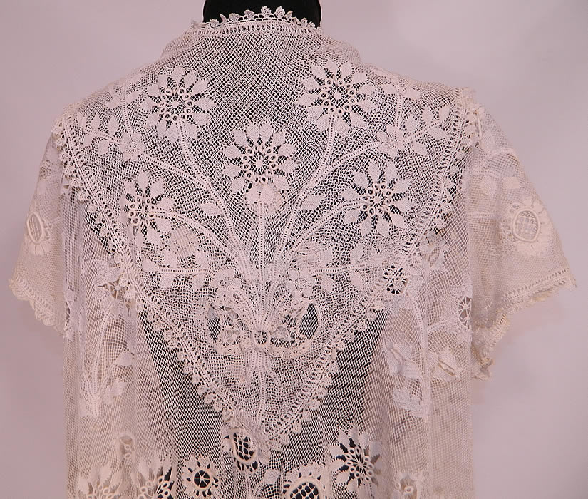 Edwardian Antique Limerick Lace White Embroidered Net Long Coat Jacket. This lovely lace long floor length coat jacket has an open front with no closure, is sheer, unlined, with short cap sleeves and large kerchief triangle shape shawl collar on back.