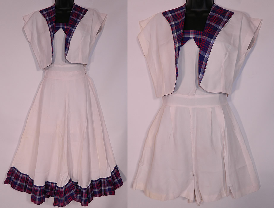 Vintage White Rayon Plaid Playsuit Shorts Skirt Bolero Jacket Coverup Outfit. This vintage WWII era white rayon plaid playsuit shorts skirt bolero jacket cover up outfit dates from the 1940s. It is made of white rayon taffeta fabric, with a red and blue plaid trim accent fabric. This sexy retro pinup outfit 3 piece set includes a one piece playsuit shorts romper with plaid shoulder straps, neckline trim and button back closures. 