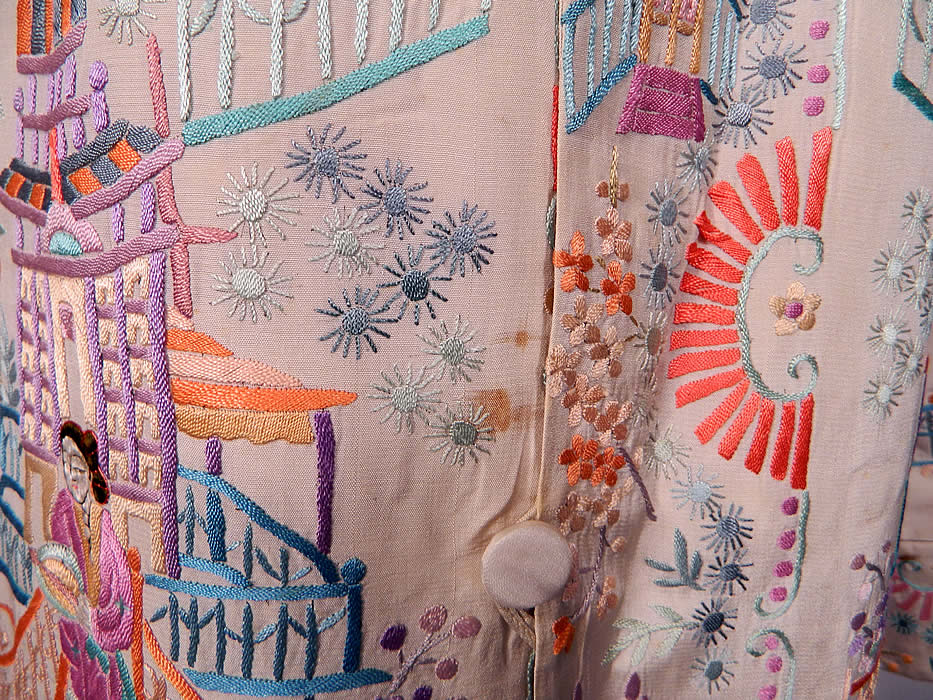 Vintage Chinese Figural Pastel Silk Embroidered Piano Shawl Long Coat Jacket. It is in good condition, with a few faint small age spot stains on the front. This is truly a wonderful piece of wearable Chinese embroidery textile art! 