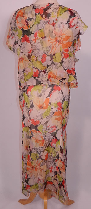 Vintage  Neon Flower Print Silk Chiffon Rhinestone Belted Bias Cut Dress &  Jacket. Included is the matching fabric jacket, with short sleeves and an open front with no closure. The jacket measures 19 inches long, with a 48 inch waist and 44 inch bust. It is in good condition. This is a wonderful piece of wearable art! 